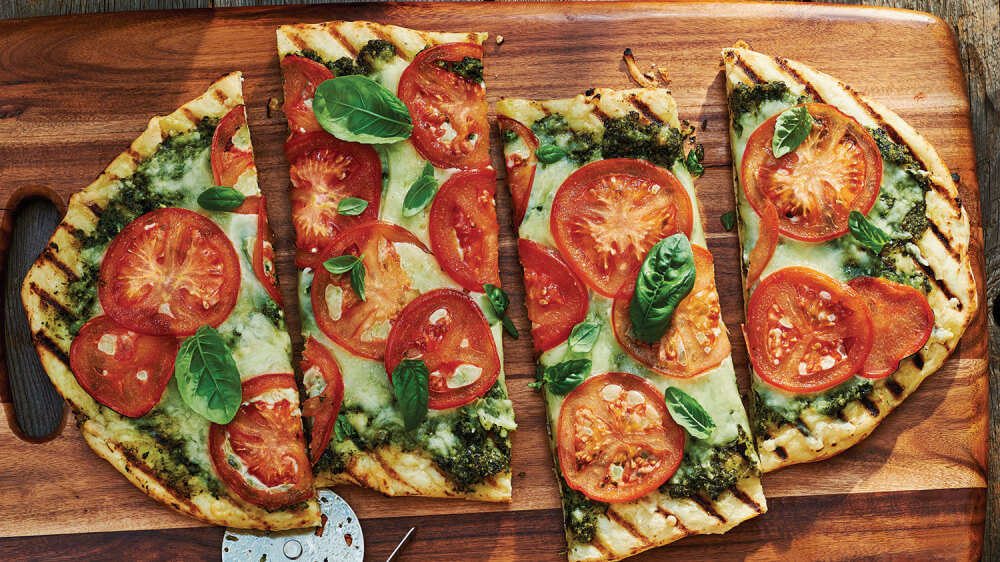 Grilled Tomato Pizza with Summer Greens Pesto